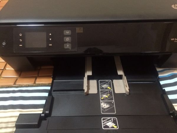 hp3548照片纸怎么放入纸盒里？