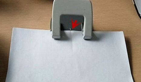 如何用打孔机在A4纸上整齐的打孔？