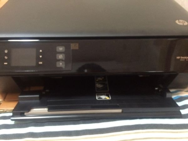 hp3548照片纸怎么放入纸盒里？
