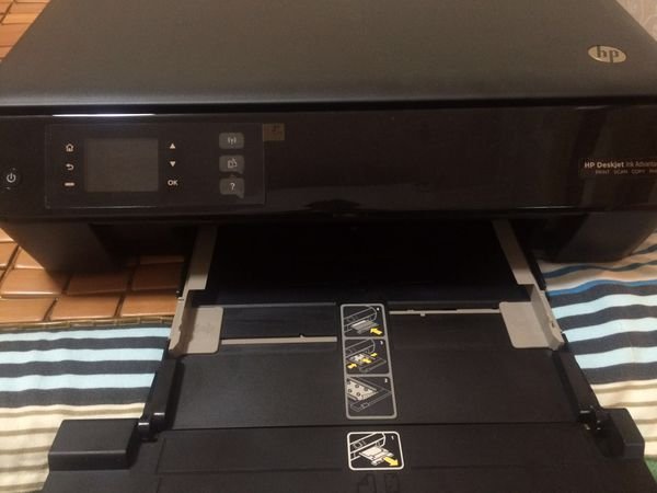 hp3548照片纸怎么放入纸盒里？